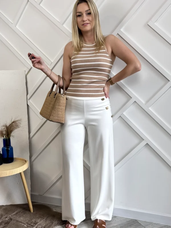 białe szerokie spodnie damskie eleganckie ze streczem złote guziki