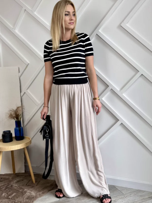 szerokie spodnie zwiewne beżowe na gumie szerokie długie nogawki